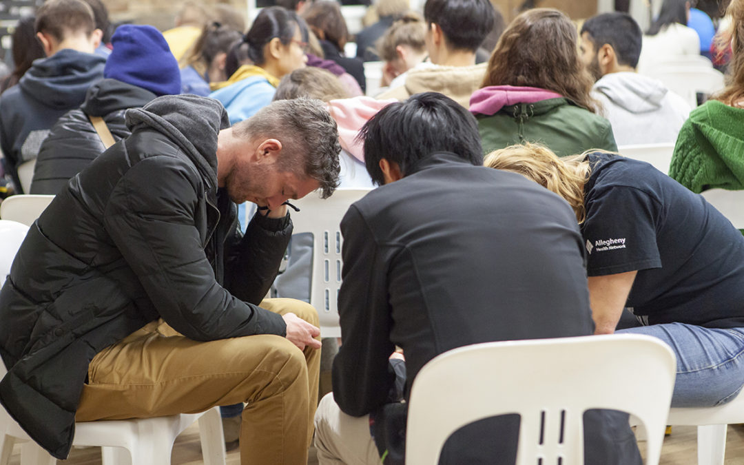 Prayer time during one of the sessions.