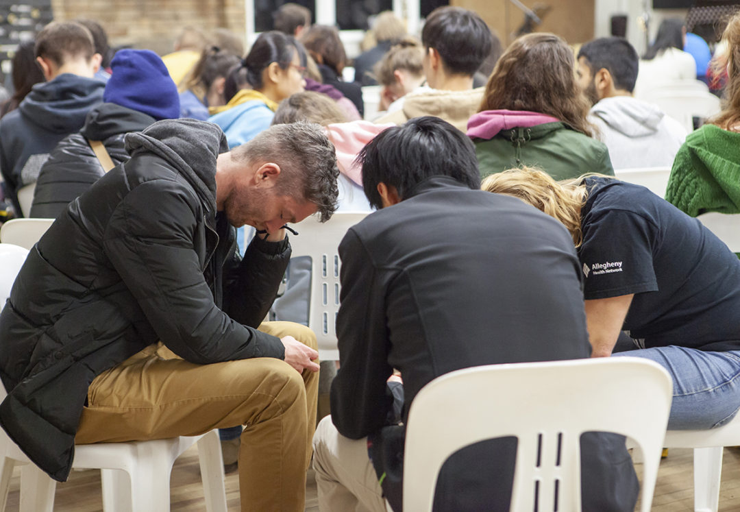 Prayer time during one of the sessions.